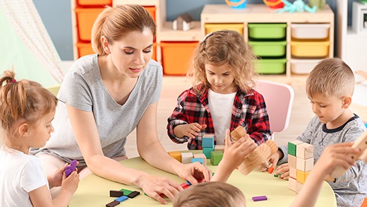 children playing in a secure nursery with Badgy identification badges