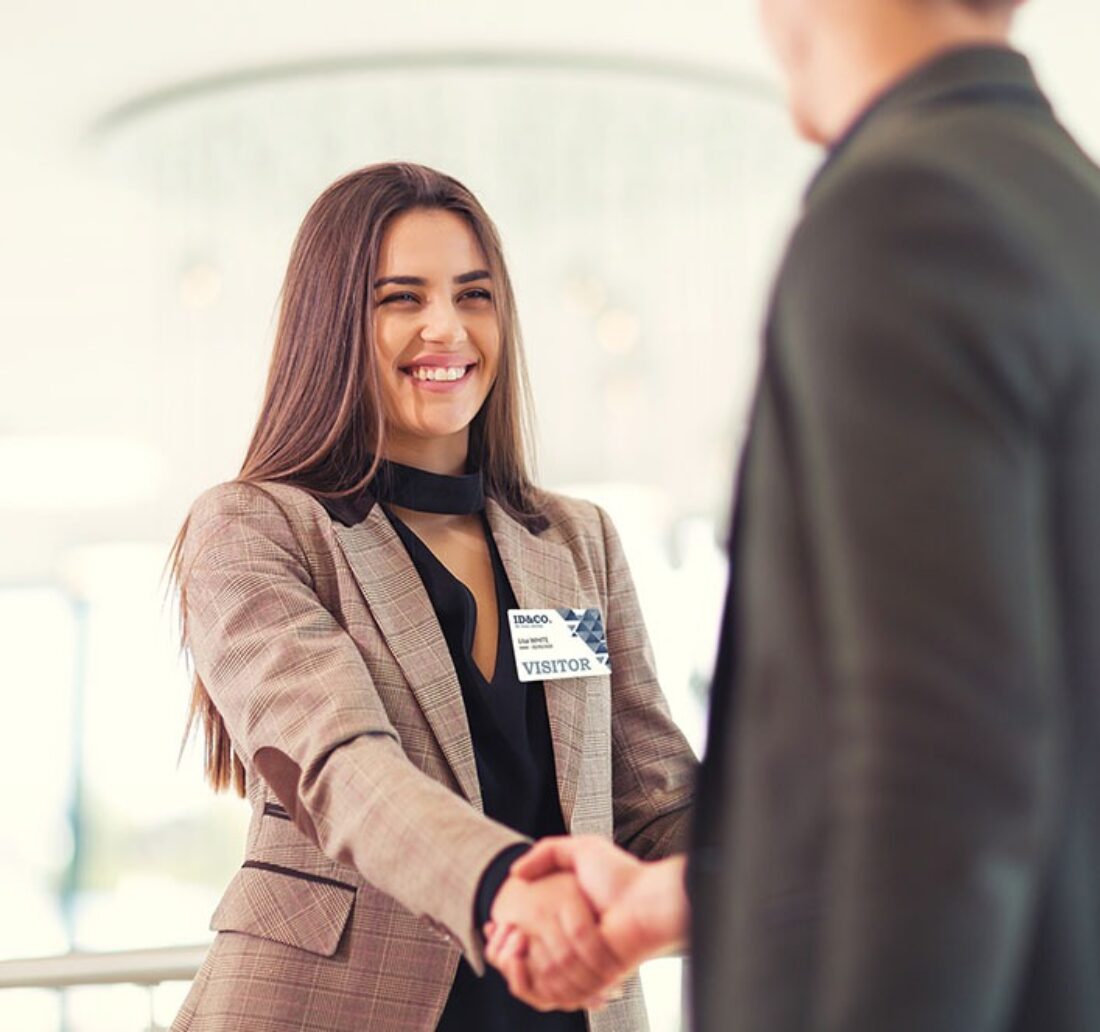 Personalization of a visitor's badge during a company meeting